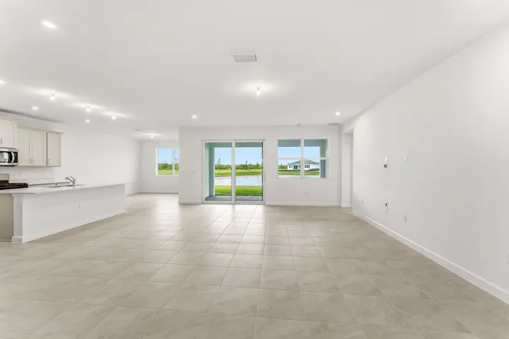 Stock photos represent builder's floorplan