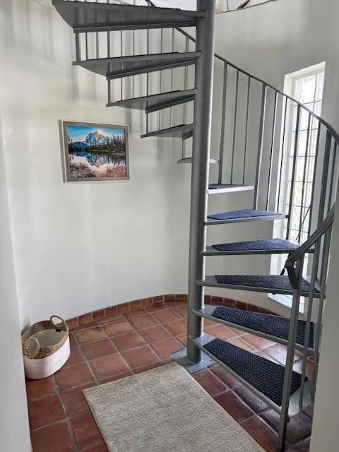 Circular stairs to second level of living area