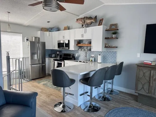 Open kitchen with eat in feature