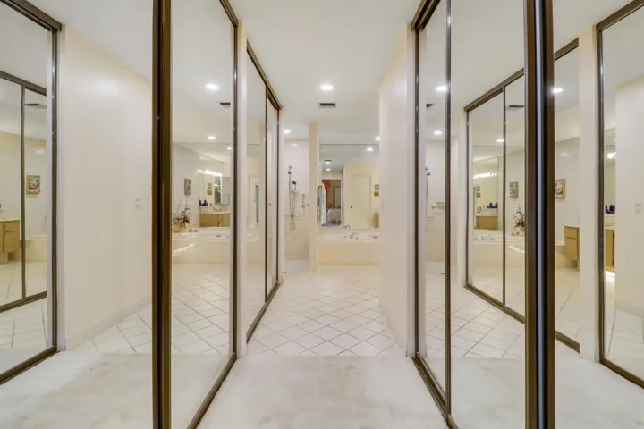 Primary Bedroom Mirrored Closet Doors