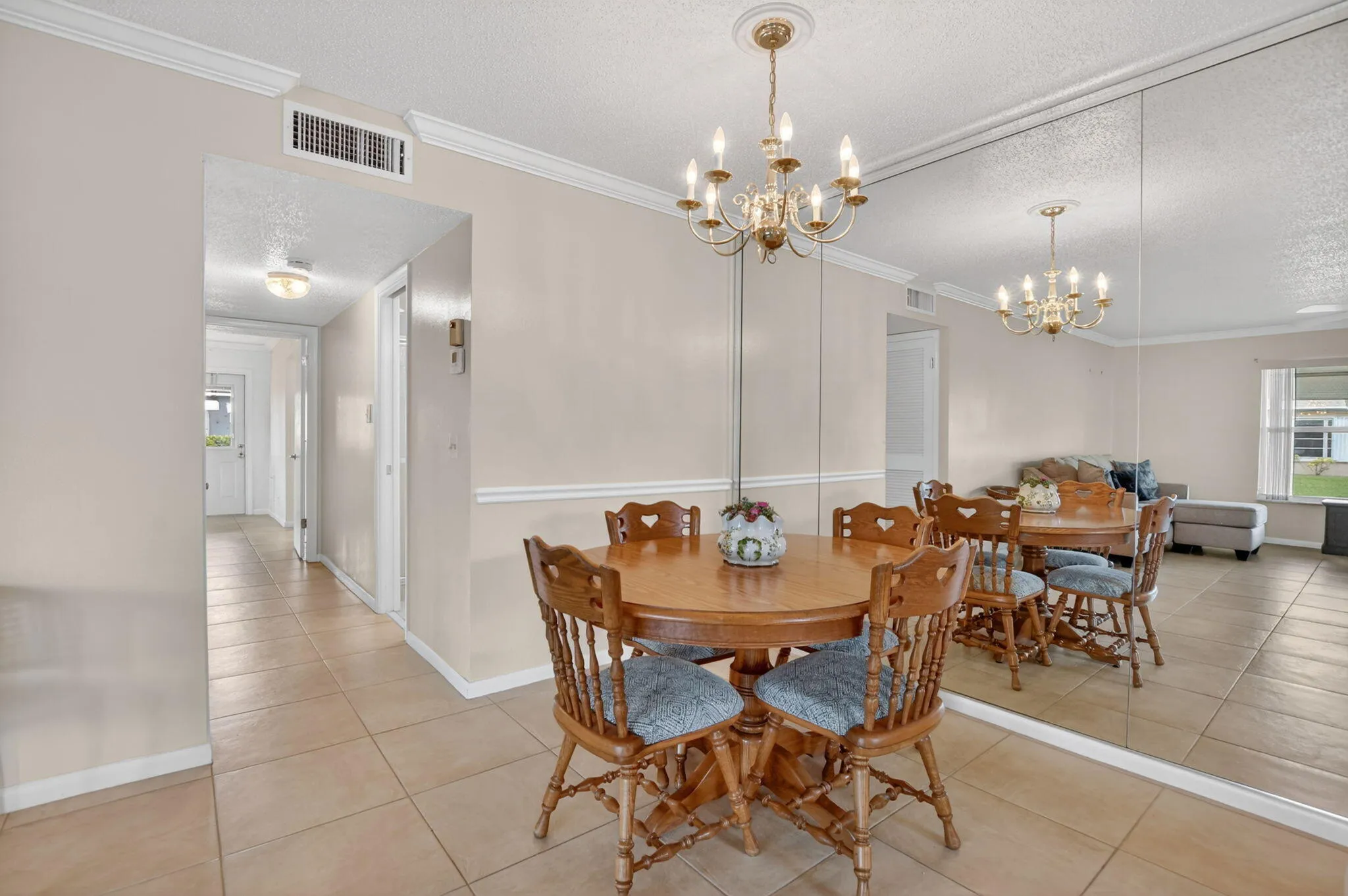 Hallway leads to beds, baths and outdoor patio