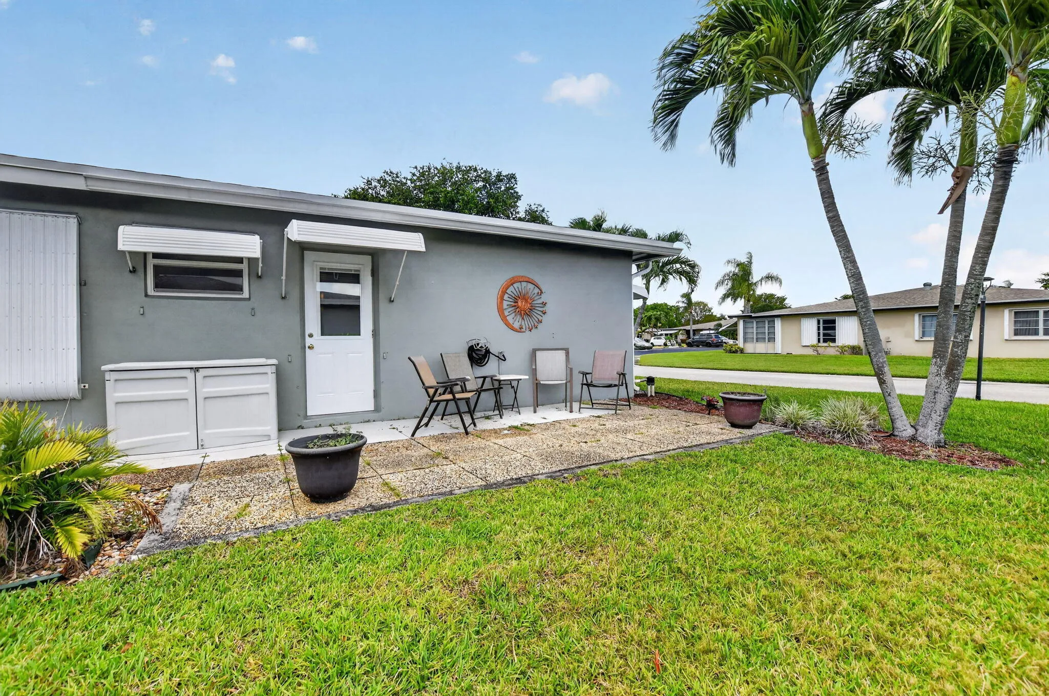 Inviting patio perfect for morning coffee, evening relaxation & peaceful green space views....