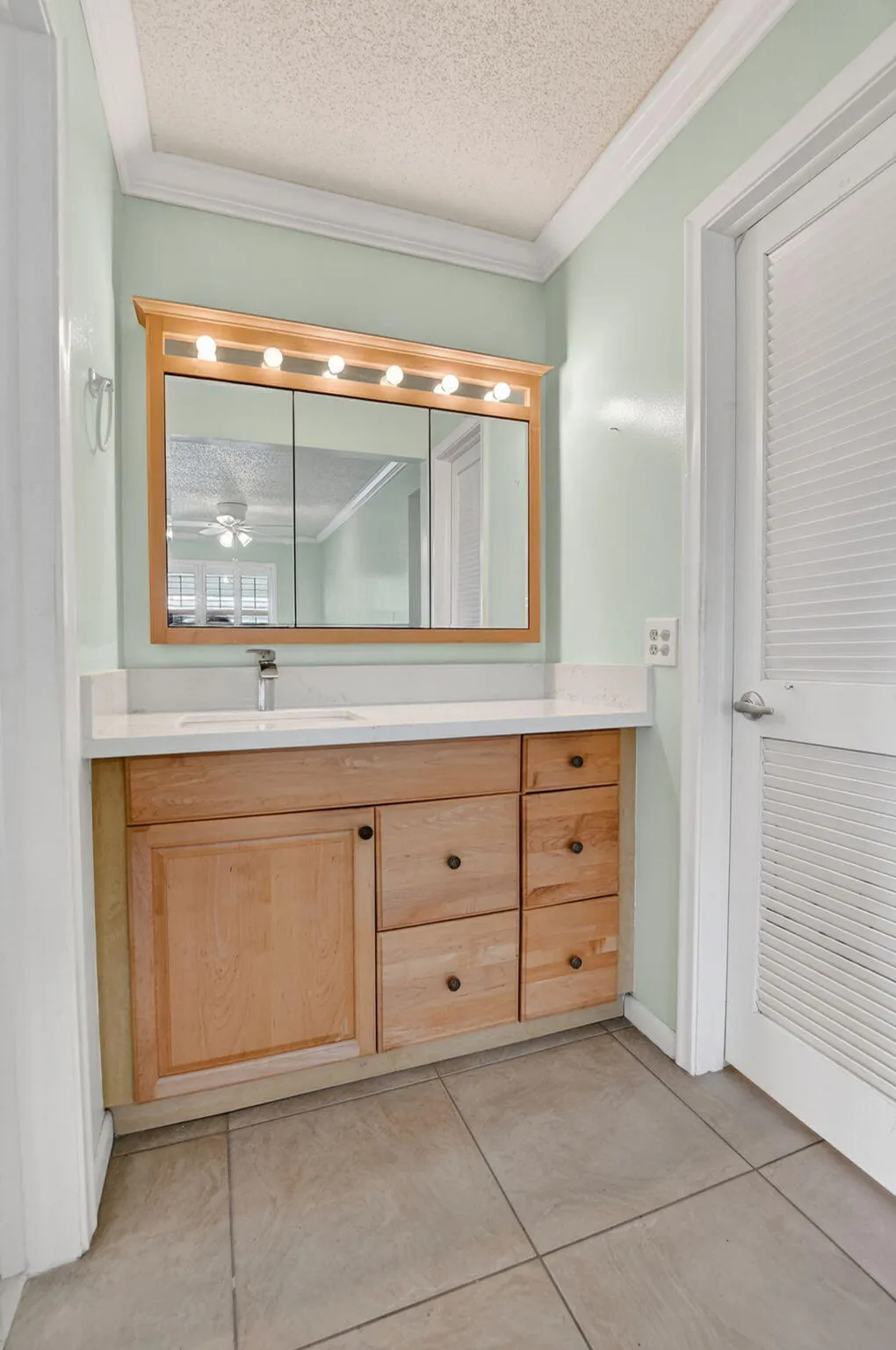 Primary Bath with dressing area and walk-in closet