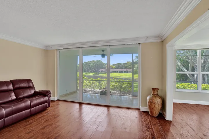 Living area and third bedroom to the right.