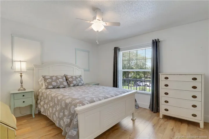 Comfortable guest accommodations with neutral finishes, wood-look flooring, and