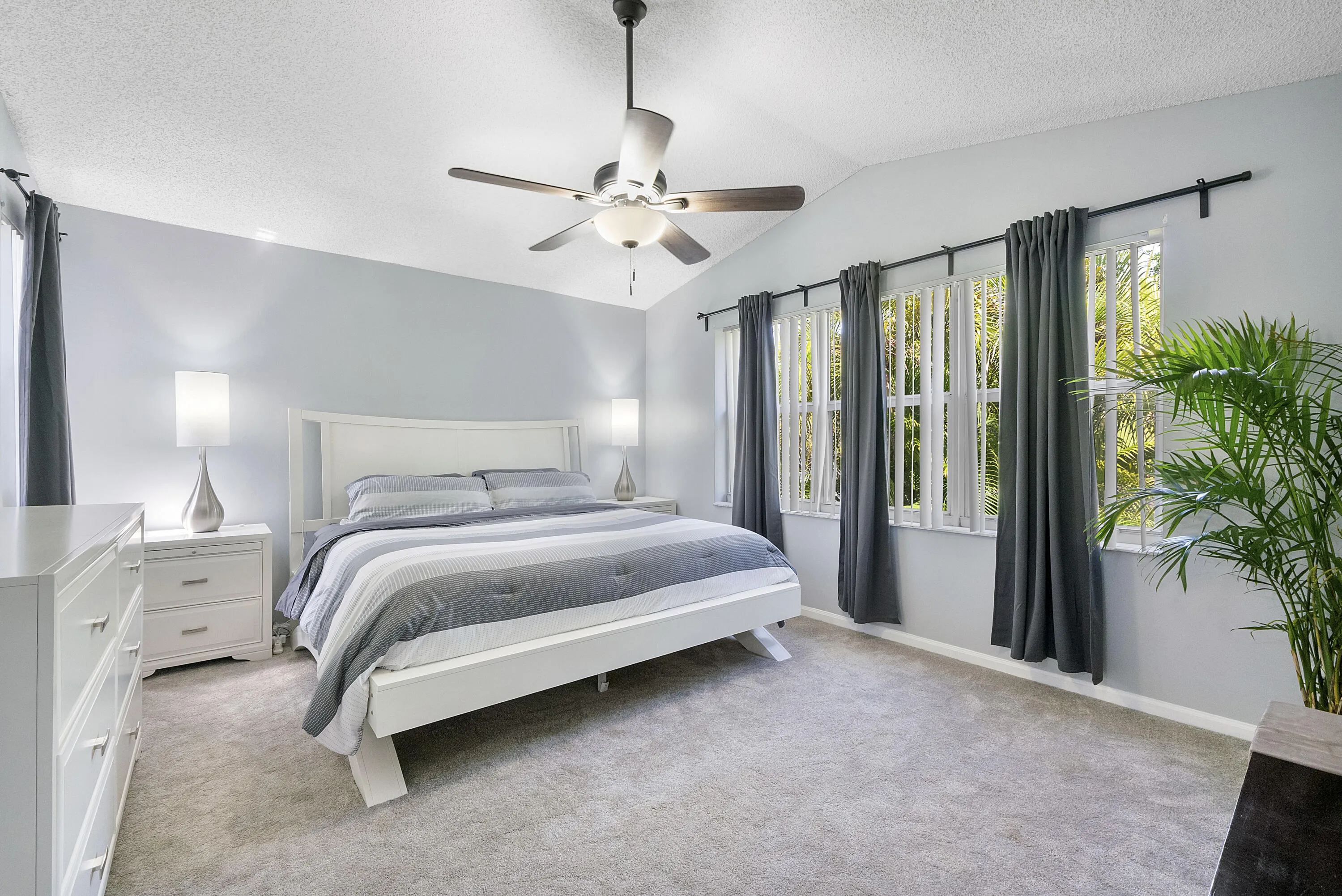 Primary Bedroom w/ Vaulted Ceilings