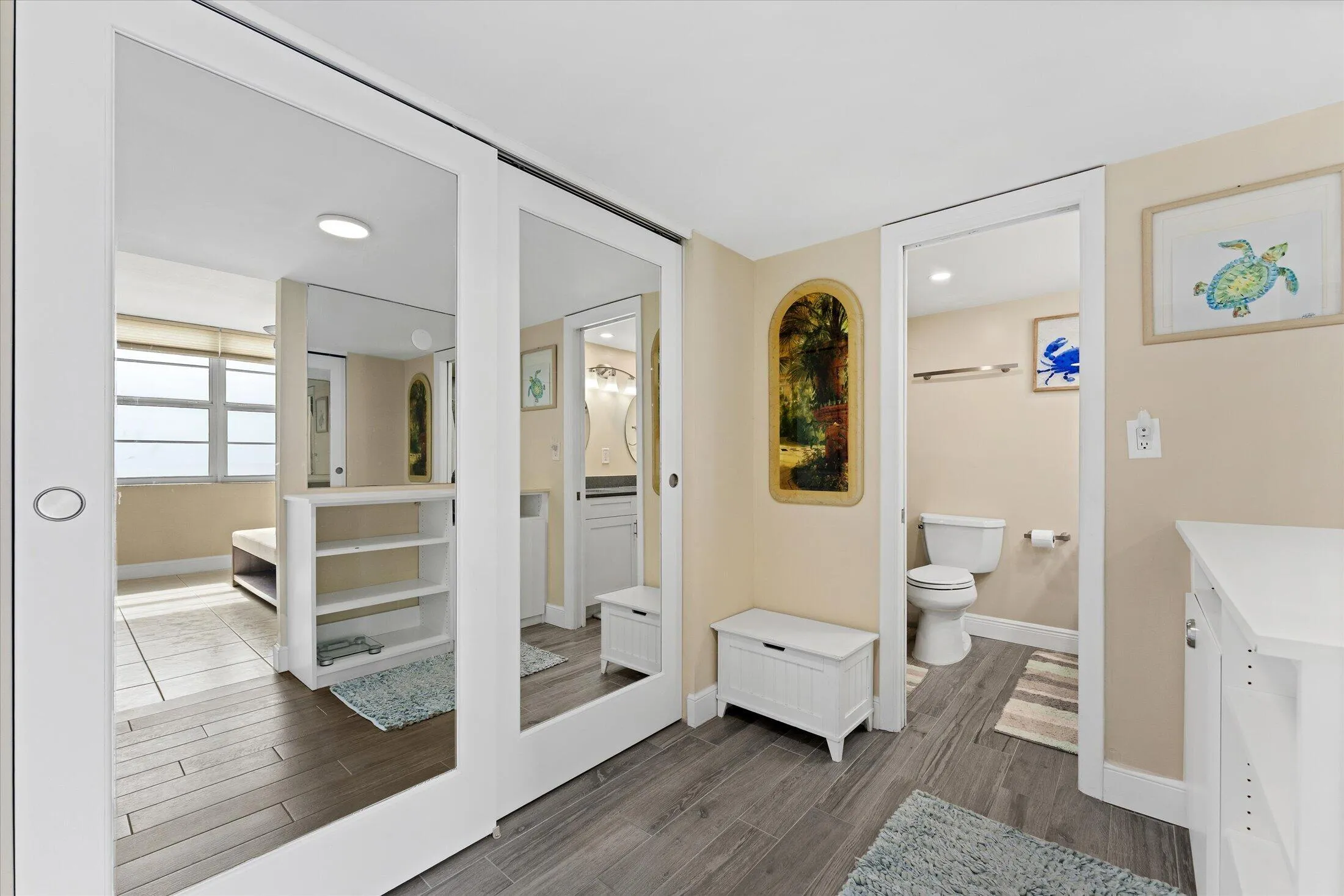 Primary closet area with full size mirror doors!