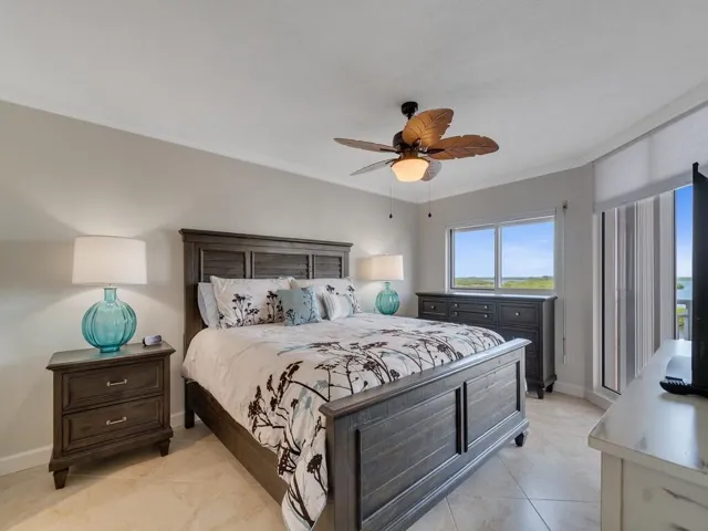 Features slider glass doors to access the balcony and to enjoy the views right from bed.