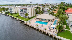 Snug Harbor Gardens Pool Side on the IntraCoastal. Located at the foot of the Woolbright Bridge. Publix, Dining, Riverwalks, Walgreens, Banks, McDonalds too!