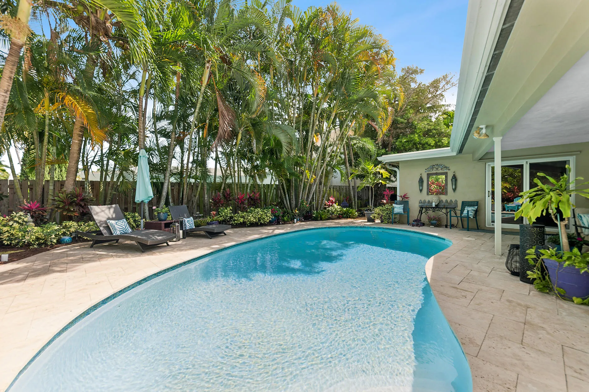 Covered patio overlooking pool