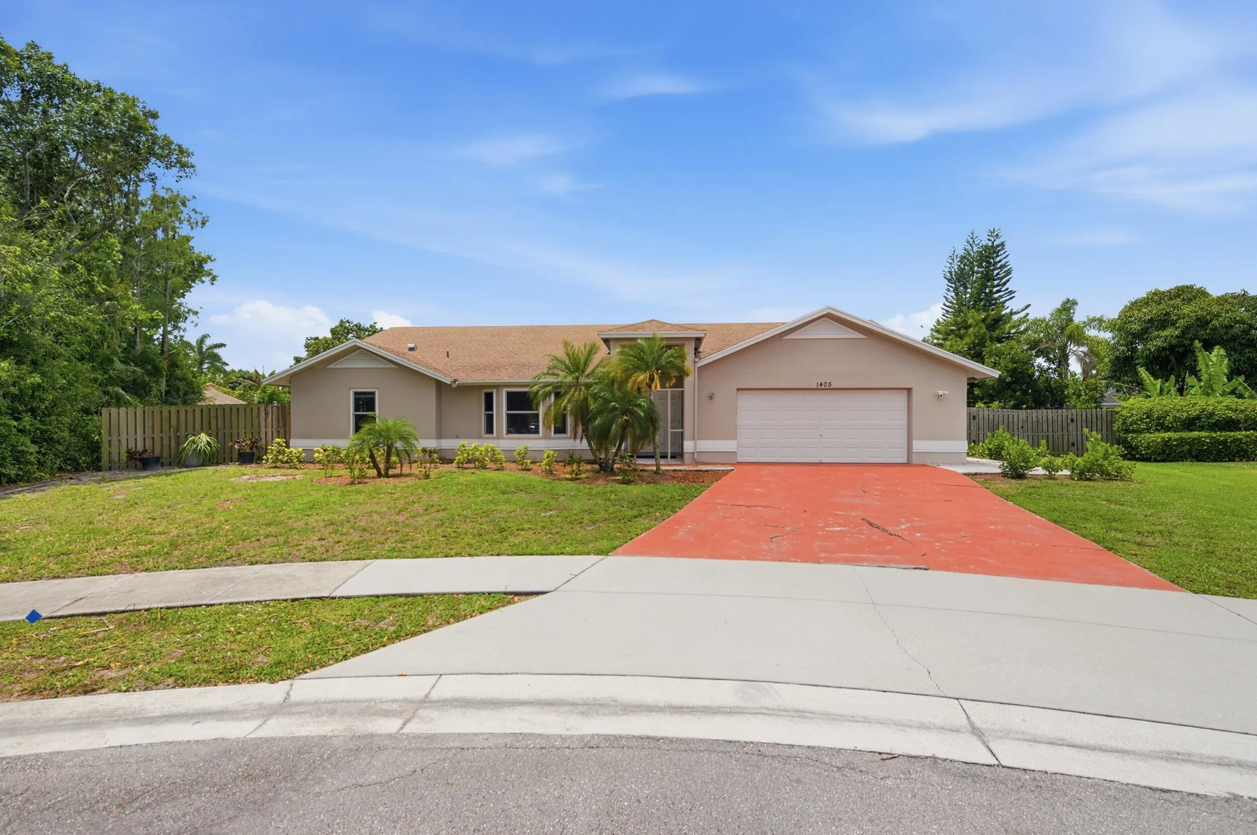 Single family home situated on a cul de sac.
