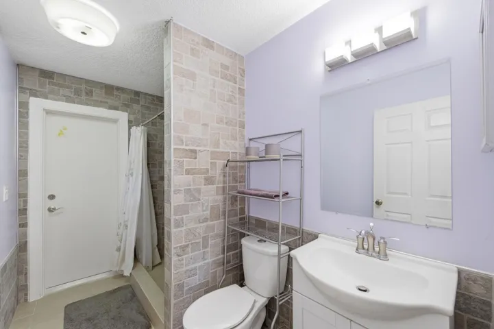 Guest bathroom with a walk-in shower.