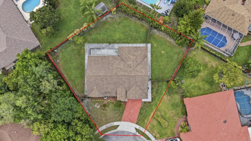 Over sized lot with plenty of fenced in areas.