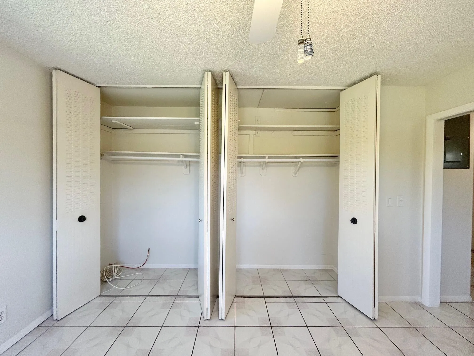 BEDROOM FULL WALL CLOSET