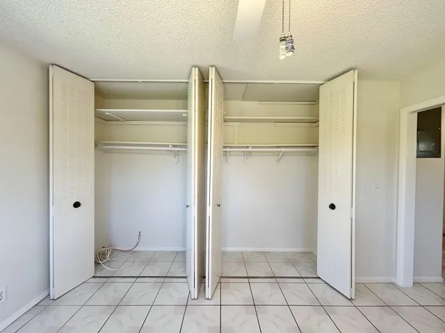 BEDROOM FULL WALL CLOSET