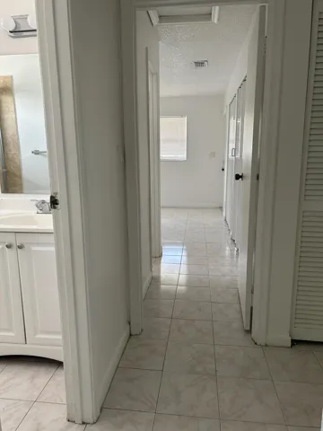 Second bathroom to the left and Master Bedroom Suite at the end of the hallway