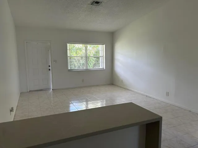 View of the living room from the eat-in kitchen