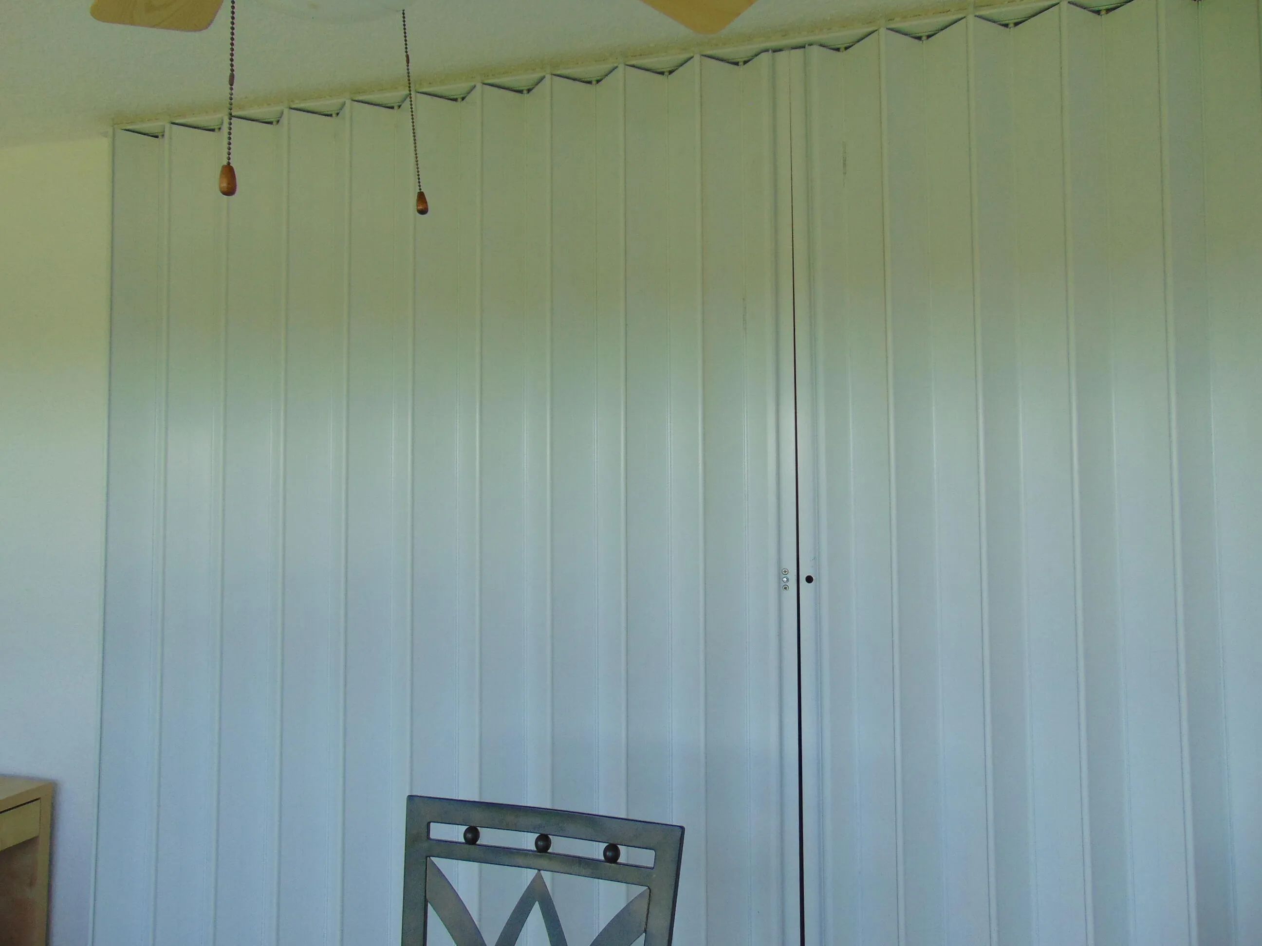 HURRICAINE SHUTTERS ON WINDOWS AND SLIDING GLASS DOOR