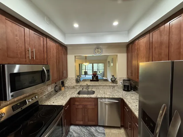 Granite & S.S. Appliances complete your updated kitchen.