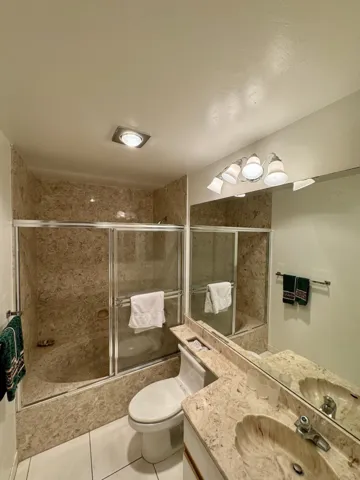 The Guest Bath has a soaking tub & shower.