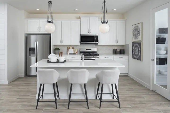 Stock photos represent builder's floorplan