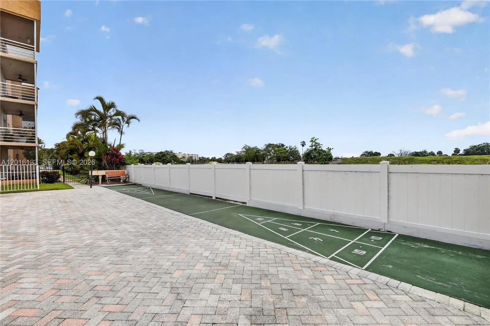 Community amenities include clubhouse, tennis, pickleball, shuffleboard, & a convenient shuttle service.
