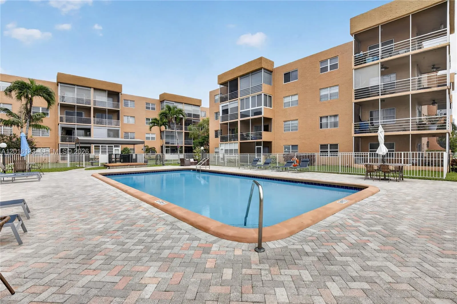 Community amenities include clubhouse, tennis, pickleball, shuffleboard, & a convenient shuttle service.