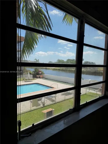 Wake up to peaceful pool and lake views