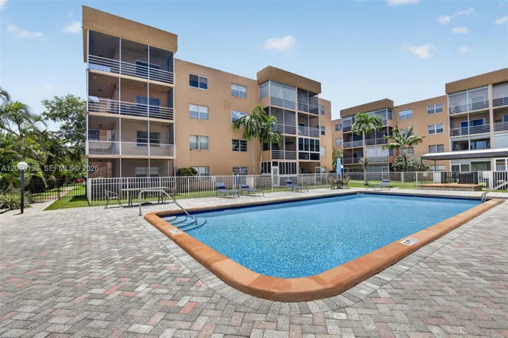 Community amenities include clubhouse, tennis, pickleball, shuffleboard, & a convenient shuttle service.