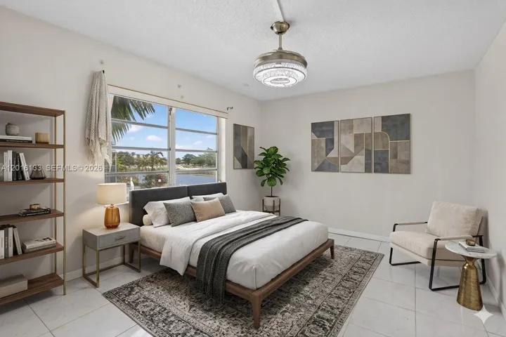 Enjoy year-round sunshine, warm breezes, and the best of South Florida living from this bright condo. This image is a virtual rendering for illustrative purposes only. Actual property conditions, features, and finishes may vary.
