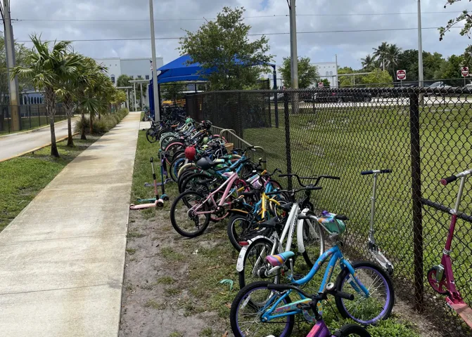 Many students in the neighborhood walk, bike or scooter to school.