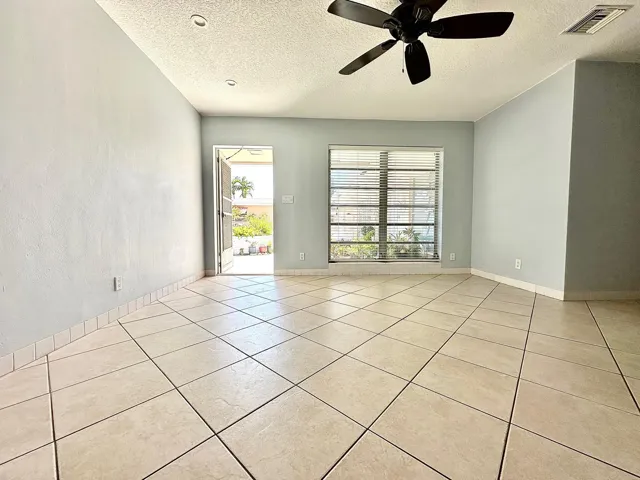 Ceramic tile flooring throughout