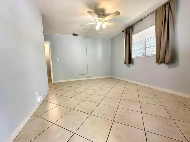 Ceramic tile flooring throughout
