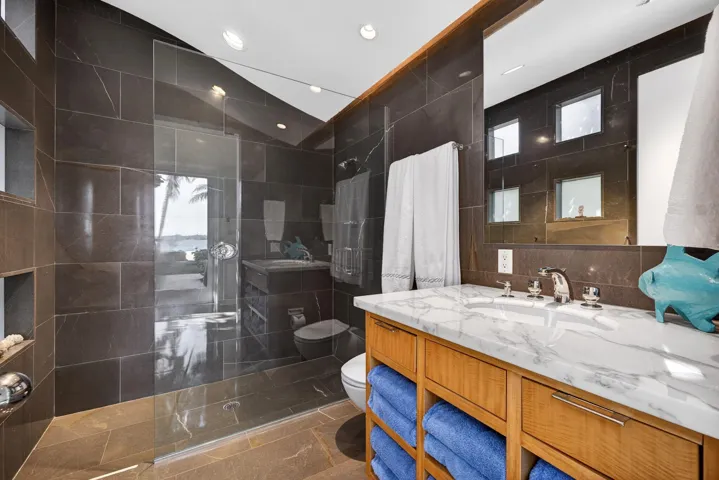 Full bathroom serves the pool area