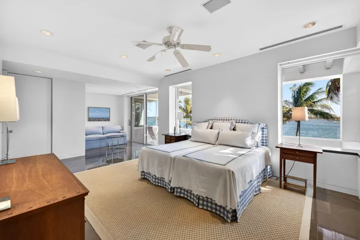 Upper guest room with sitting area and balcony