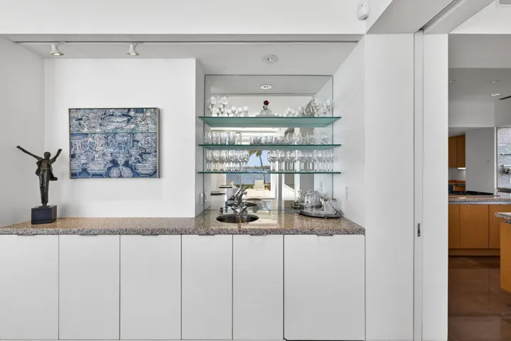 Entertain with ease with this bar in the dining area adjacent to the kitchen