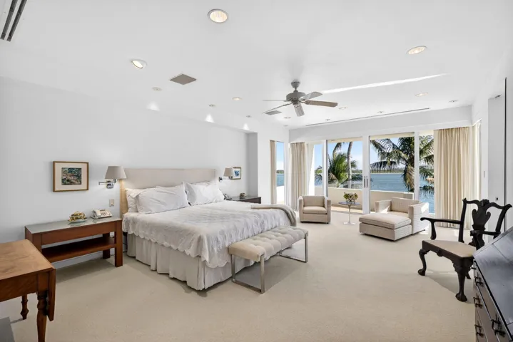 Spacious primary suite with sitting area and balcony overlooking the Inlet and the Atlantic Ocean