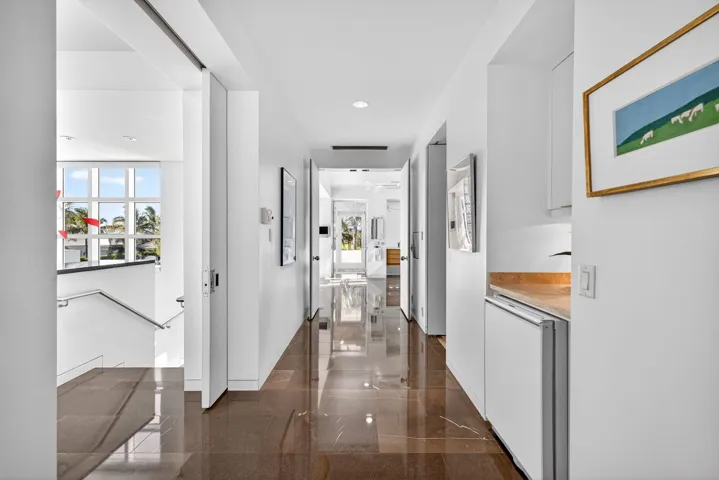 Primary suite with two generous walk-in closets, two water closets, and spacious ensuite bathroom