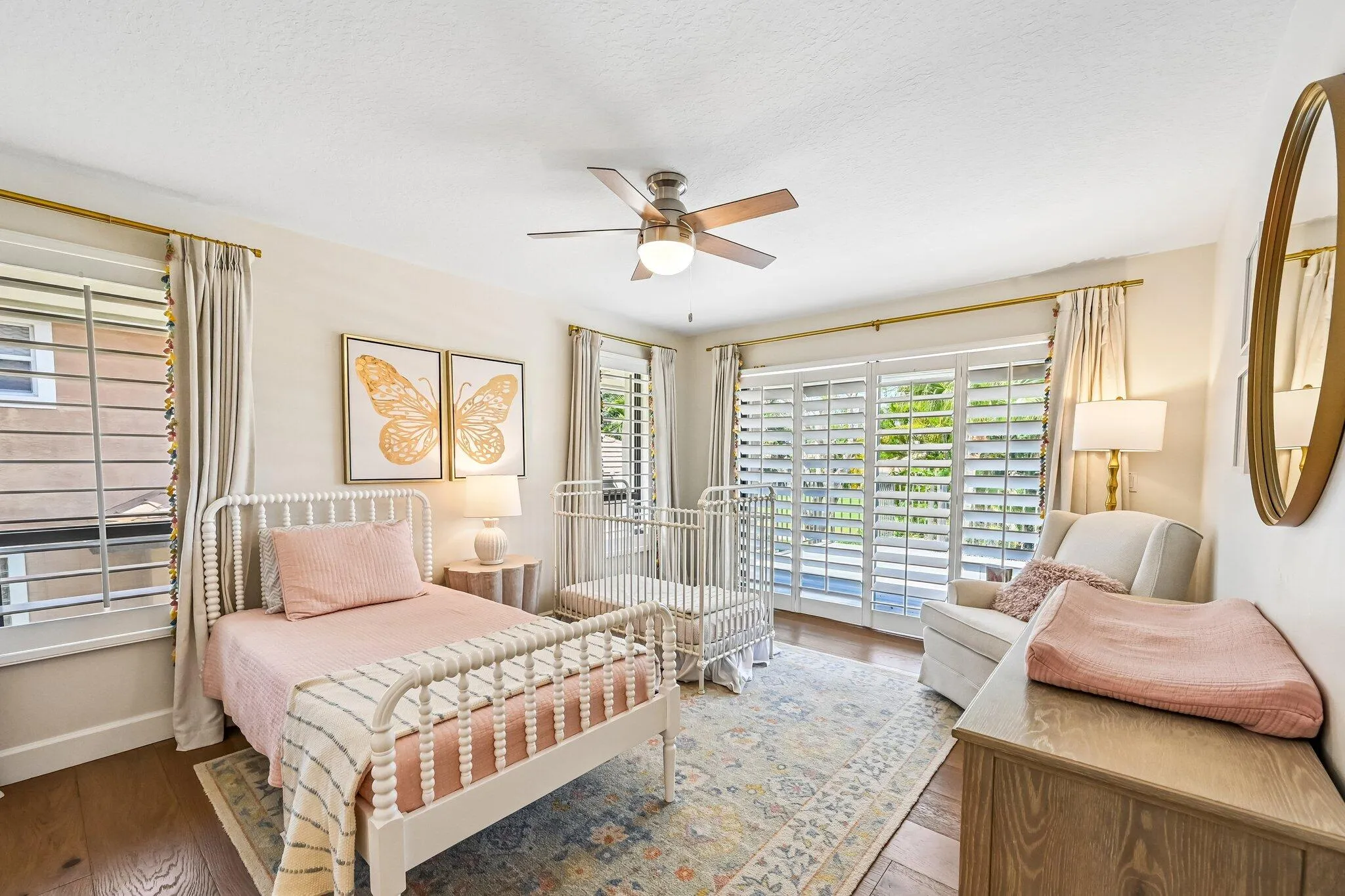 Designed for versatility, bedroom #4 may function as a secondary primary suite featuring dual closets and a well-appointed en suite bathroom.
