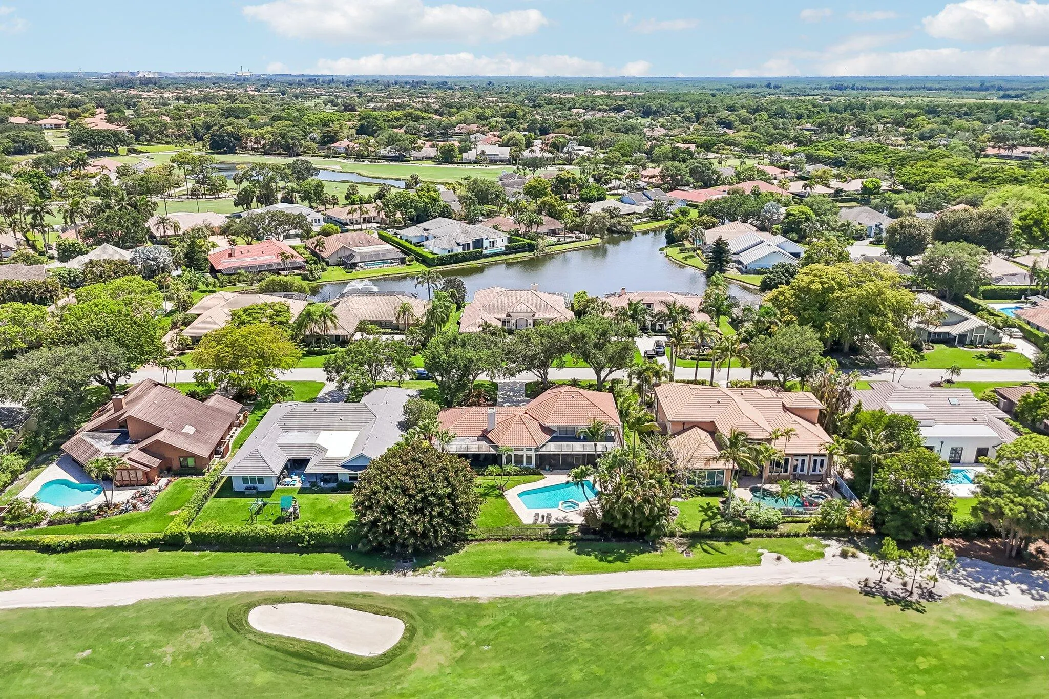 Welcome home to 15 Carrick Rd, a distinguished residence set in the heart of PGA National in Palm Beach Gardens.