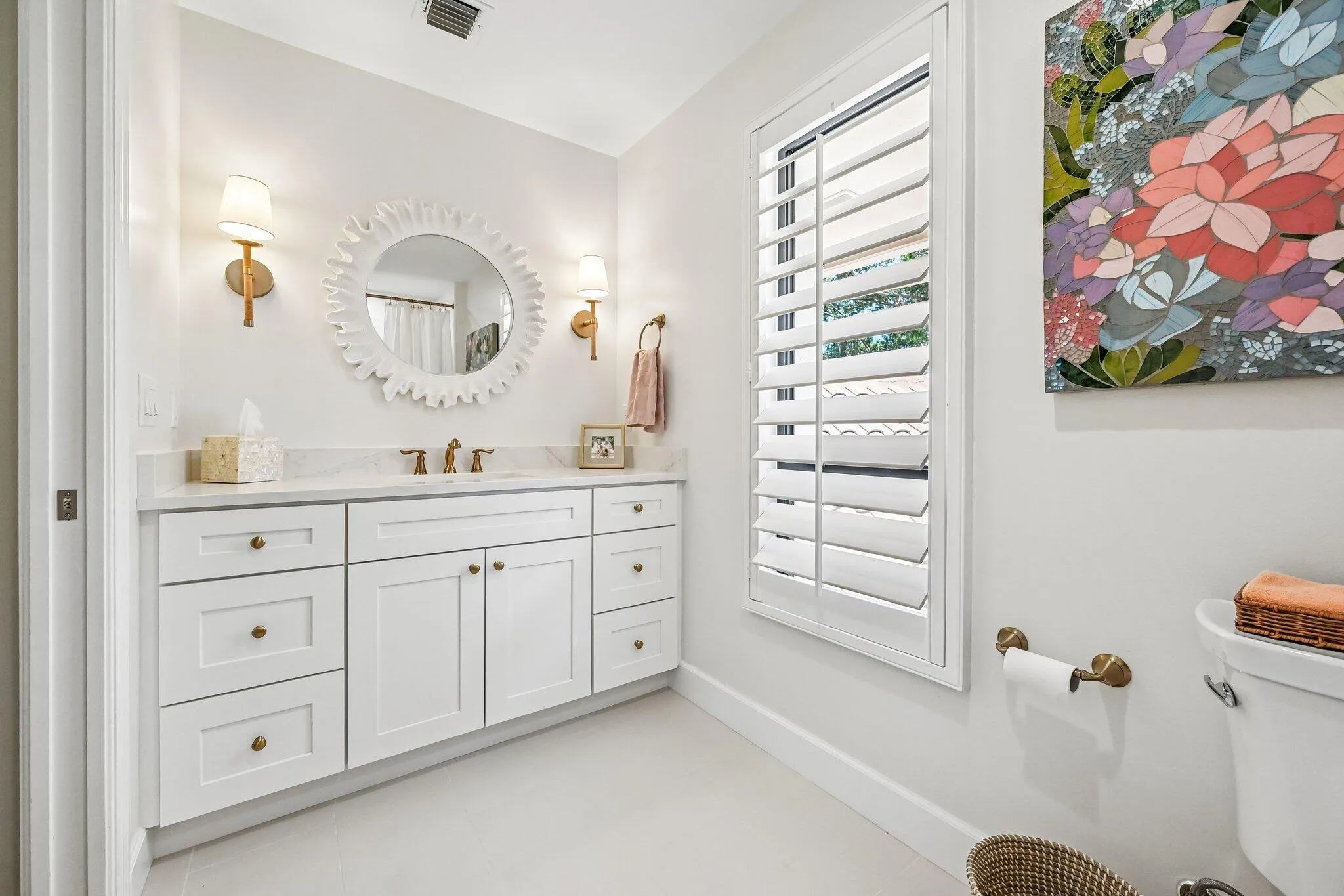 Bathroom #4 is an en suite to bedroom #4 and offers a generous layout with a shower/tub combo and refined, elegant design details.
