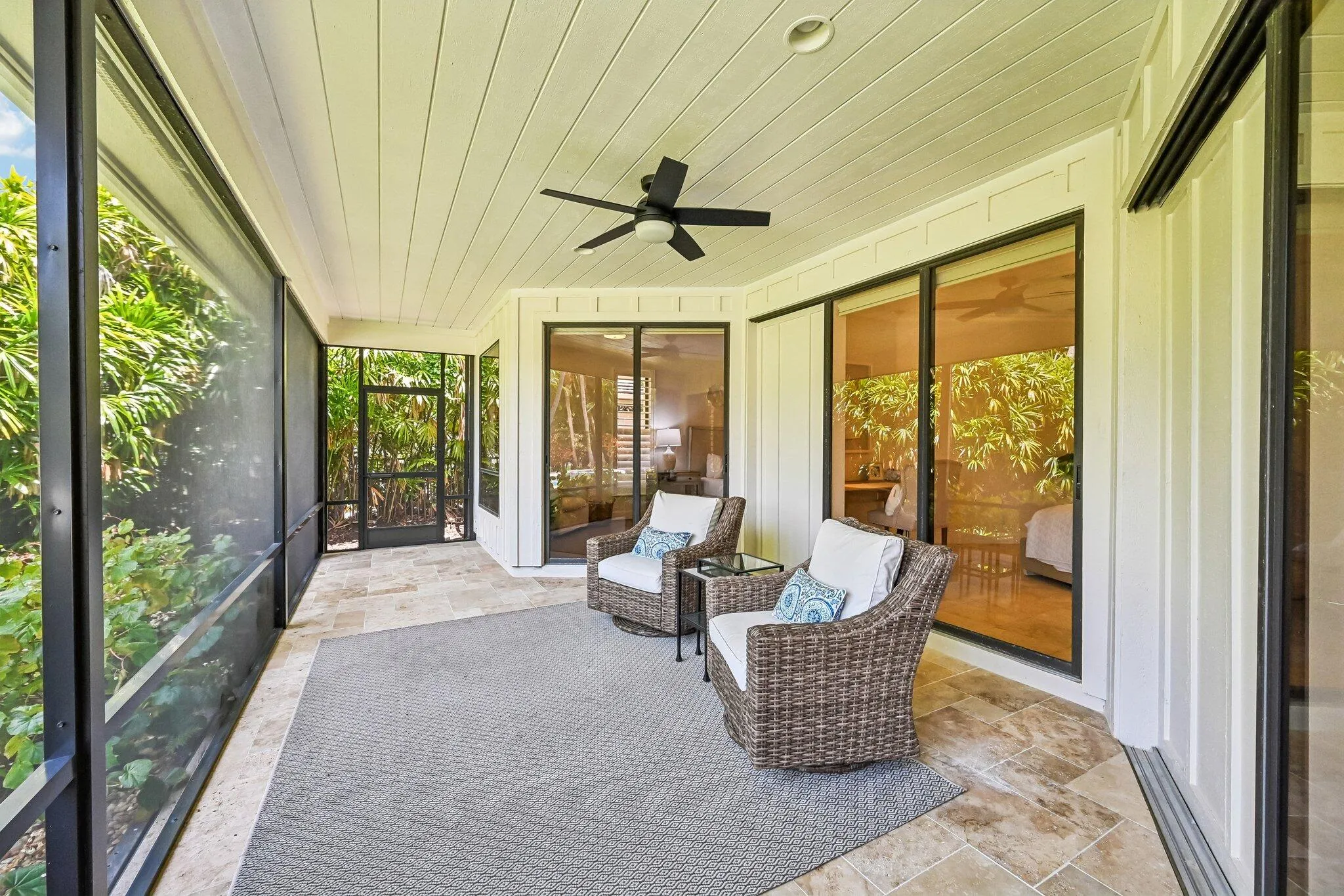 Accessible from both the primary suite and secondary bedroom/office, Lanai #2 provides a tranquil extension of the living space ideal for relaxation.