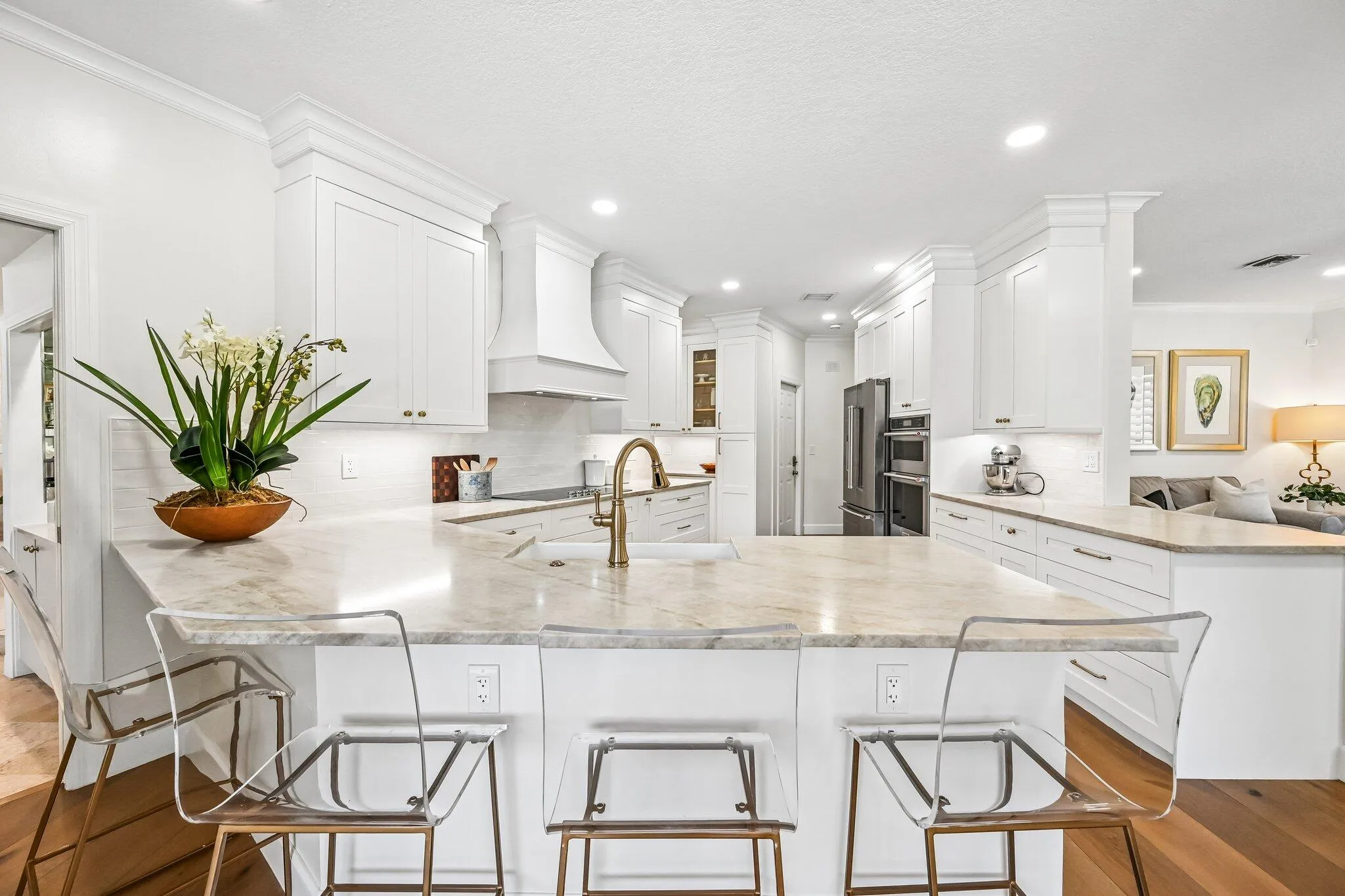 Casual dining for 4 in the kitchen with new Taj Mahal quartzite counters f