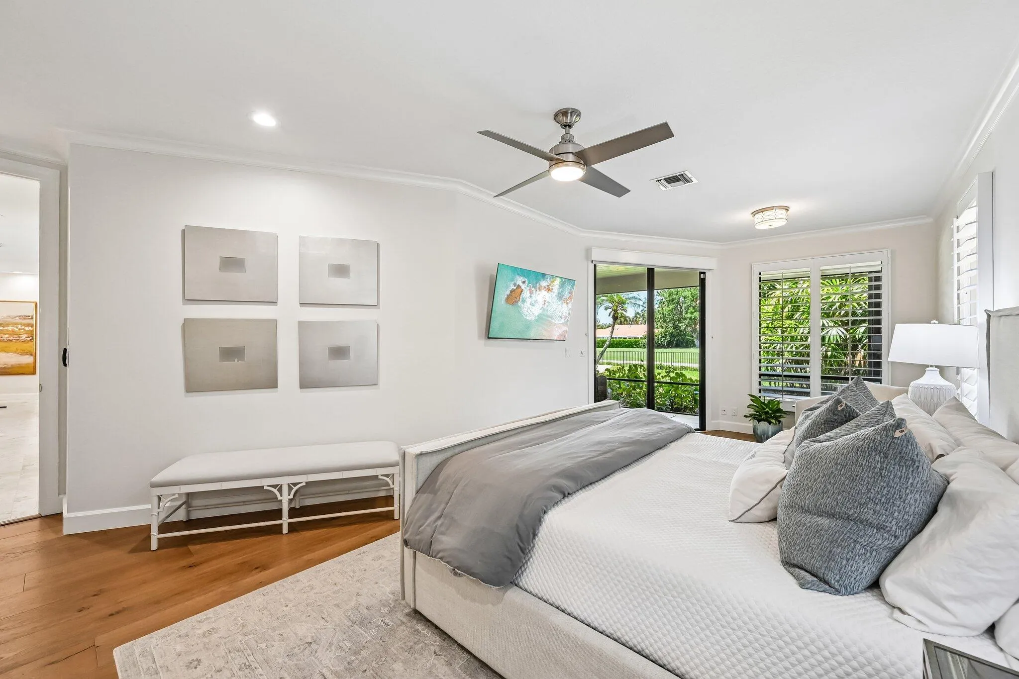 The downstairs primary suite is thoughtfully positioned near the fourth bedroom, offering the perfect opportunity for a private office, nursery, or flexible living space.