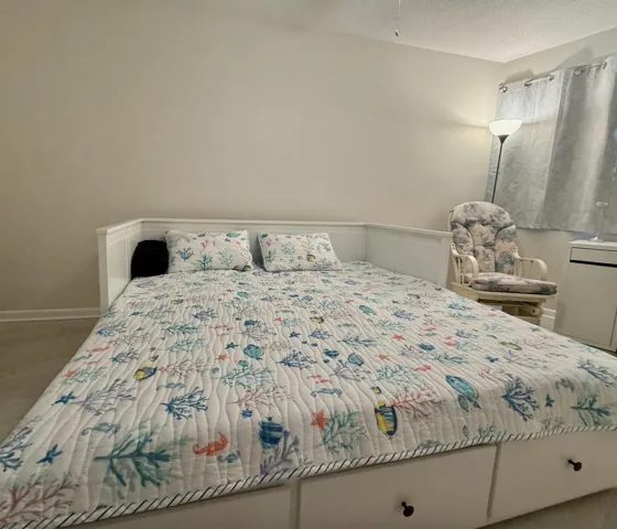 Trundle bed pulled out to queen. Can also be split in to 2 twins.