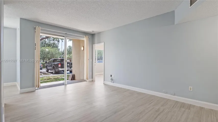 primary bedroom door in center.