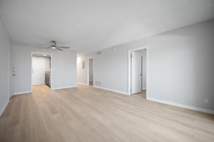 Units PH 1406 & PH 1407 are being sold together for $565,000.Unit 1407 living area with access to kitchen and the two bedrooms.