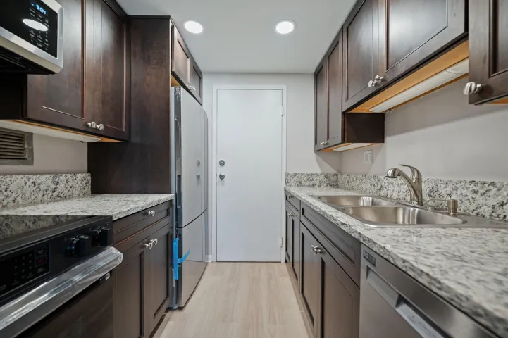 Units PH 1406 & PH 1407 are being sold together for $565,000. Unit 1407 kitchen (brand new)
