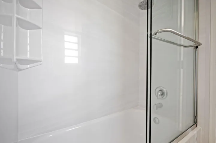 Units PH 1406 & PH 1407 are being sold together for $565,000. Unit 1406 new bathtub.