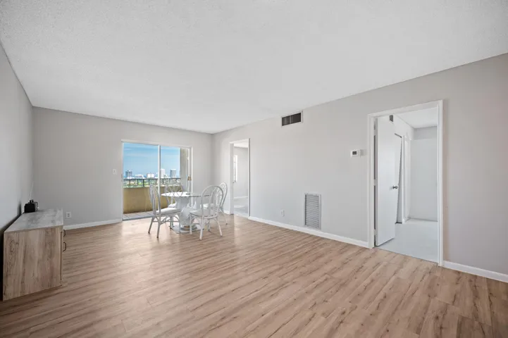 Units PH 1406 & PH 1407 are being sold together for $565,000. Unit 1406 Living area, the balcony and the two bedroom doors.